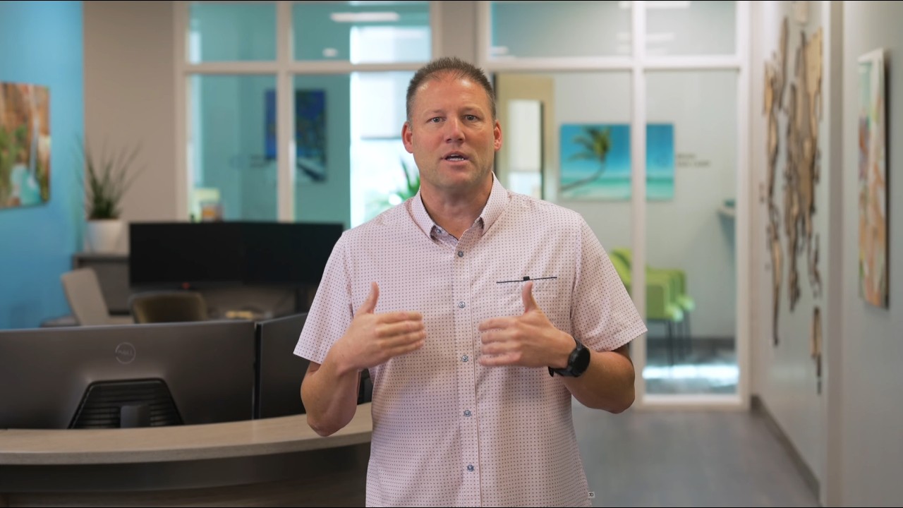 Brian Van Camp, Board Chair of the Linked Accounting Alliance, speaking in the office